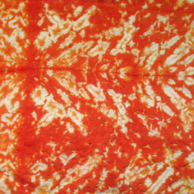 An orange silk shibori scarf by Maureen Jakubson