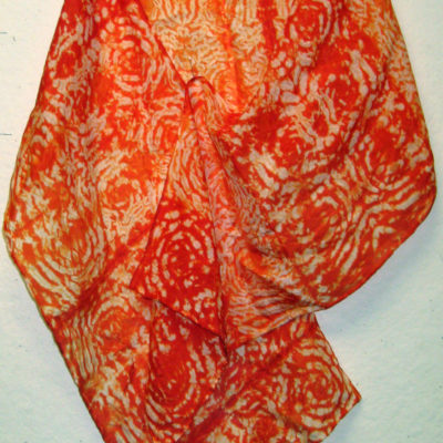 Orange Silk Shibori Scarf With Spiral Pattern by Maureen Jakubson