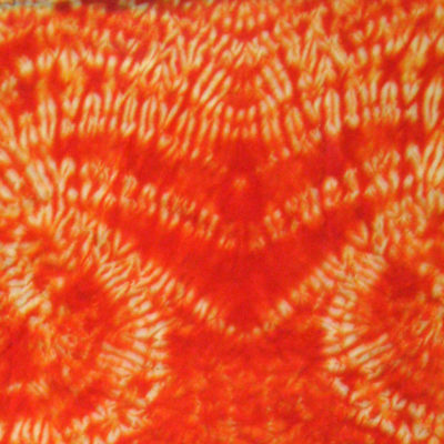 Detail of Orange Silk Shibori Scarf by Maureen Jakubson